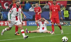 开云体育平台APP-格鲁吉亚队在比赛中以惊人比分击败对手，晋级欧国联四分之一决赛的简单介绍